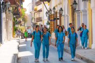 Nursing students walk in a street in Cartagena, Colombia